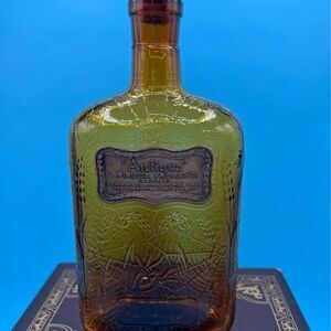 Bottle Amber Glass Embossed Spider Web Design